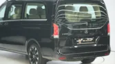 2026 Mercedes Benz V 300 Avantgarde Black White Rear View Angled Zoom
